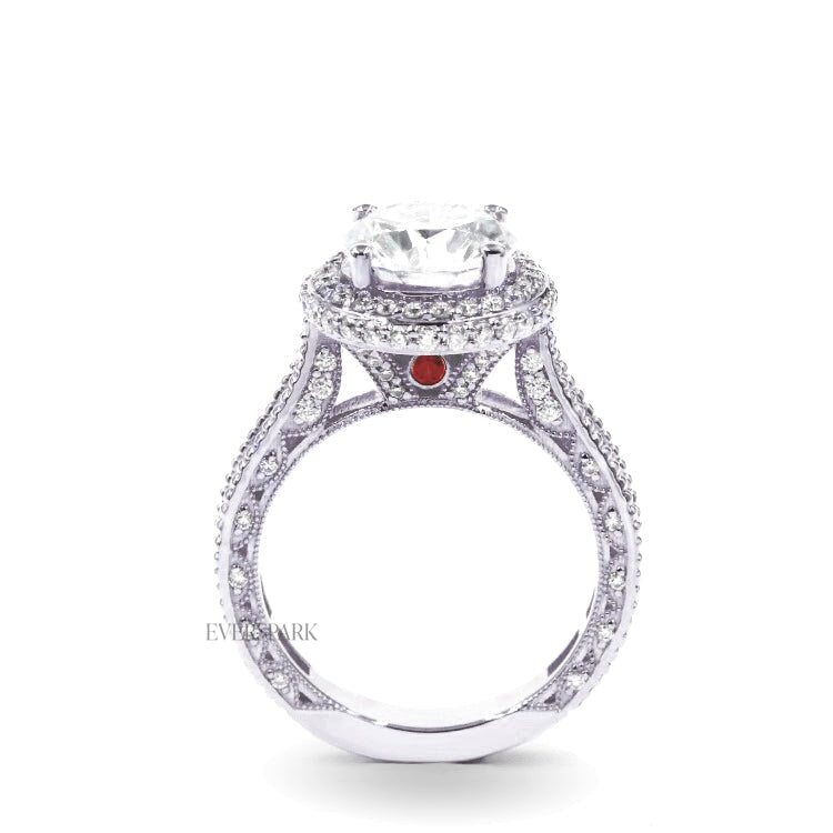 Pia Ruby Platinum engagement ring - side profile view - hand-cut Everspark Moissanite, cathedral setting, halo, pave sidestones, milgrain details, peekaboo sidestones, 7mm, 7.5mm, or 8mm round cut center stone, available in 18k White Gold, 18k Yellow Gold, 18k Rose Gold, Platinum 950, Blue Sapphire, Pink Sapphire, Ruby or Emerald sidestones, video: Pia Platinum with Blue Sapphire sidestones, 8mm center stone.